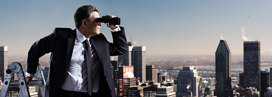 man on ladder with binoculars searching for something